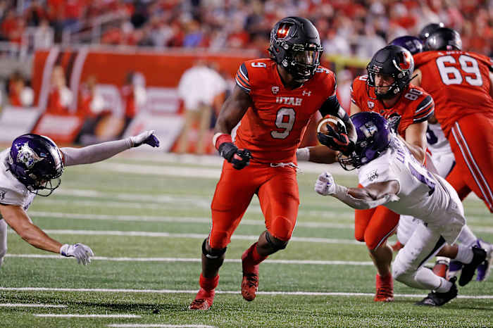 Utah running back Tavion Thomas (9) runs for a touchdown against Weber State.